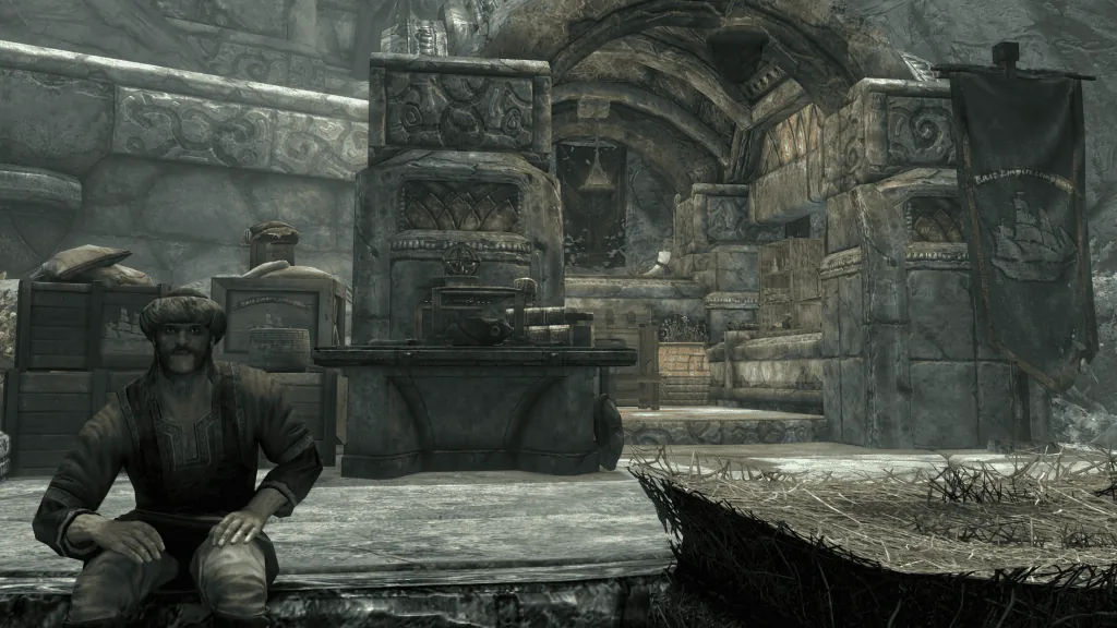 An East Empire merchant in Markarth sits with his legs hanging off the edge of the large stone dias that his stall is built on.